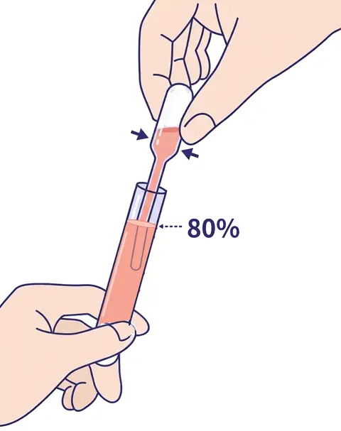 Filling the white-capped container to about 80% with a dropper